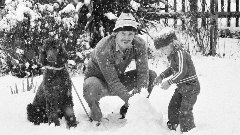 Terry Yorath and son Daniel playing in the snow in 1979