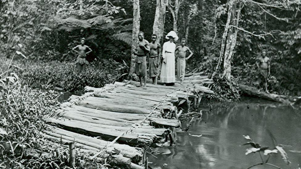 English missionary and photographer Alice Seeley Harris crossing a bridge in the Belgian Congo, c1900