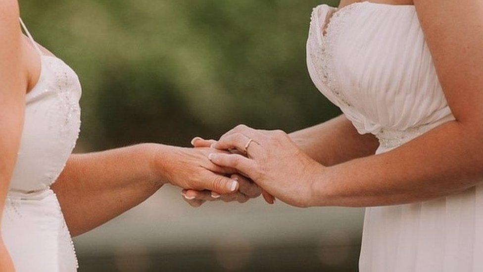 Hands of Michelle and Kelly Norris