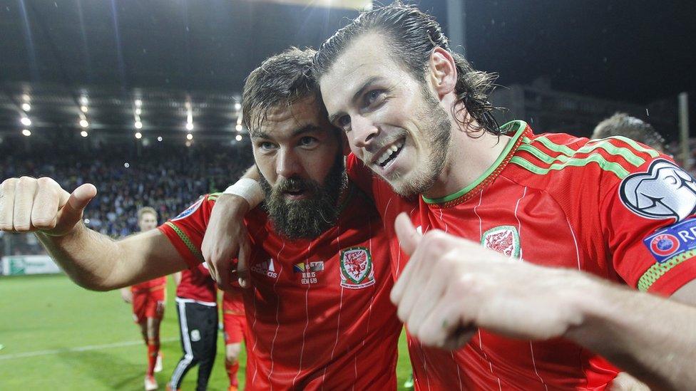 Gareth Bale (r) and Joe Ledley (l) celebrate after the match