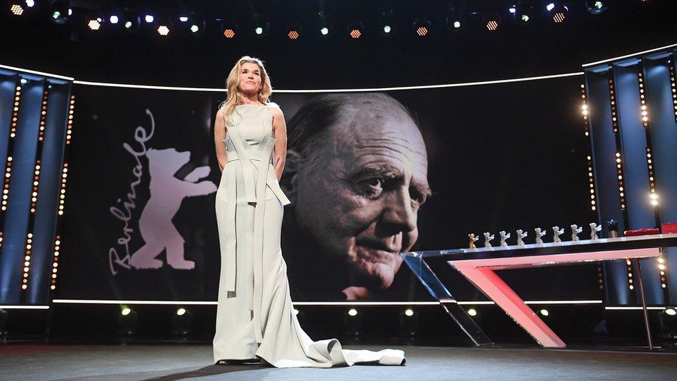 Anke Engelke is seen on stage (in the background actor Bruno Ganz)