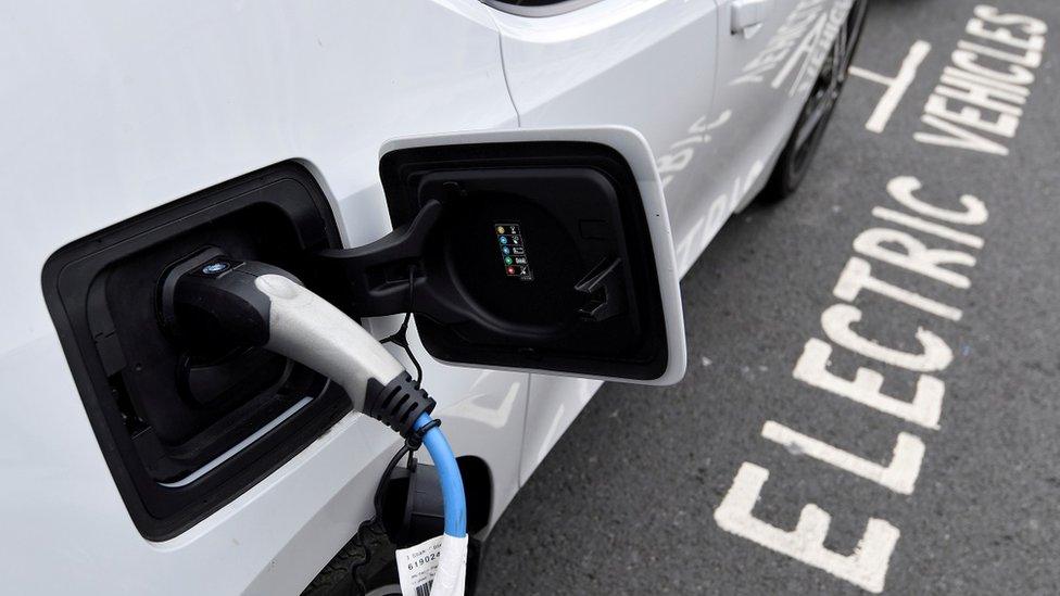 Generic image of an electric car being charged in London