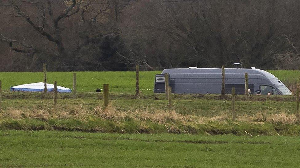 Police tent near the scene