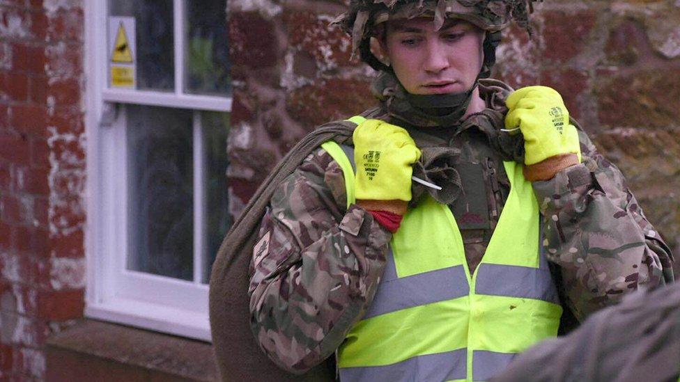 Members of the Army setting up flood defences in Appleby, north-west England, on 25 December 2015