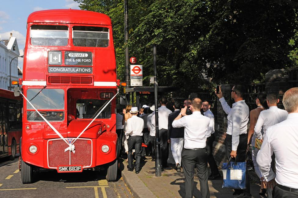 Double-decker wedding bus at Jason and Mark Ford's wedding