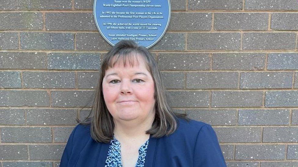 Sue Thompson with plaque