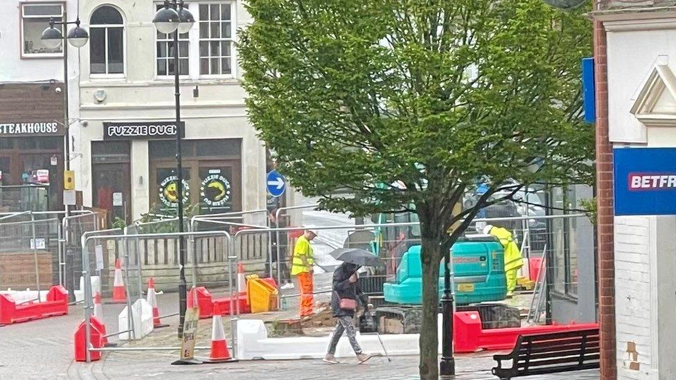 Blocked off area with builders in Yeovil town centre