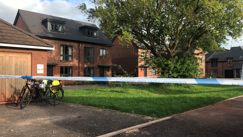 Police 'do not cross' cordon near houses