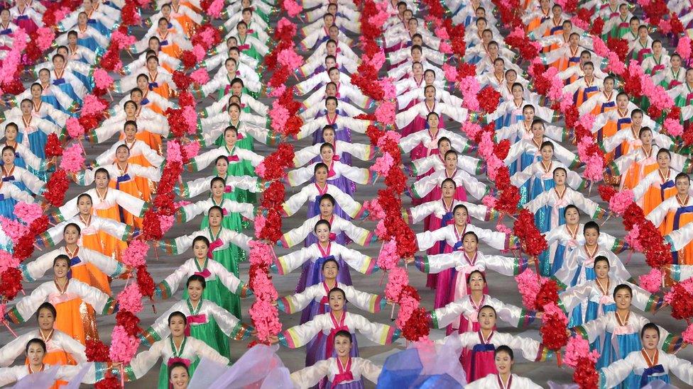 In a photo taken on September 19, 2018 performers dance during a "mass games" gymnastic and artistic performance