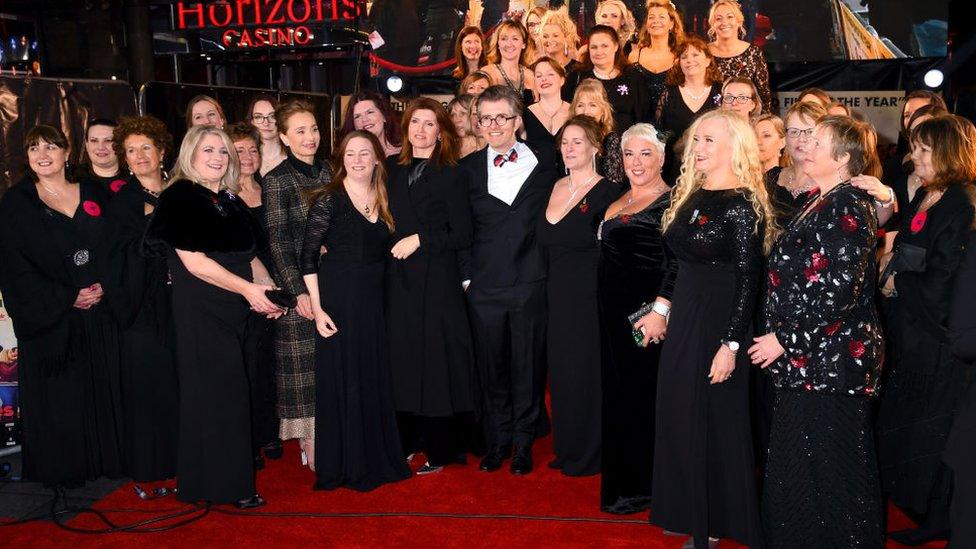 Kristin Scott Thomas, Gareth Malone and Sharon Horgan with the Combined Military Wives Choir at their London UK film premiere in February