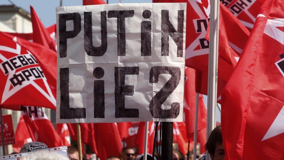 Russian communists take part in protest rally against a government proposed pension reform plan in Moscow, 2 September 2018