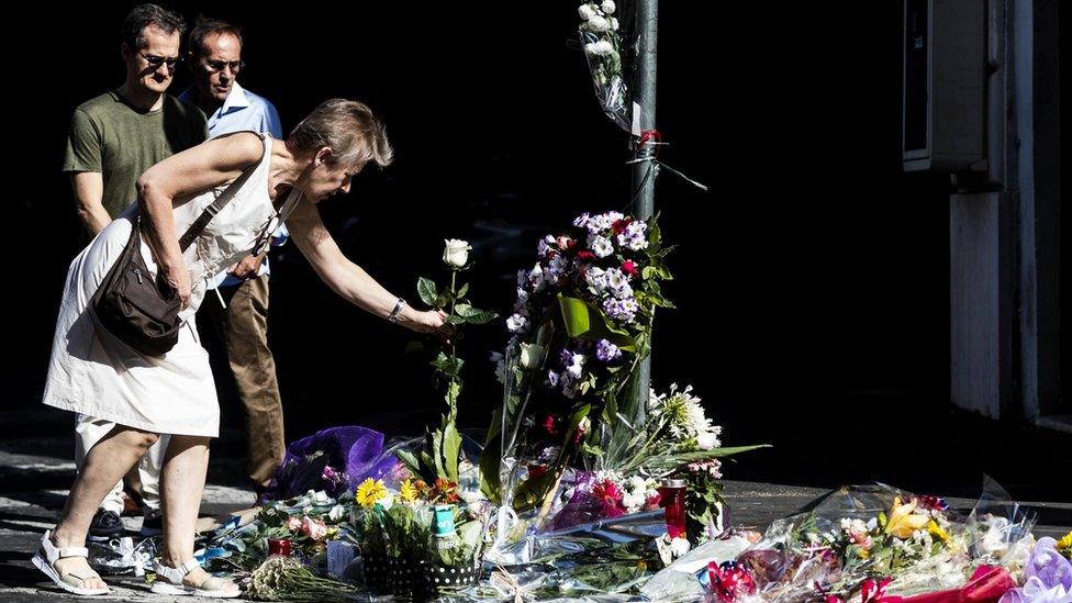 Notes and flowers have been placed at the site where the Carabiniere police officer Mario Cerciello Rega was stabbed to death in Rome, Italy, 27 July 2019.