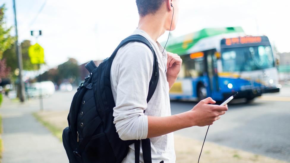 Pupil waits for bus