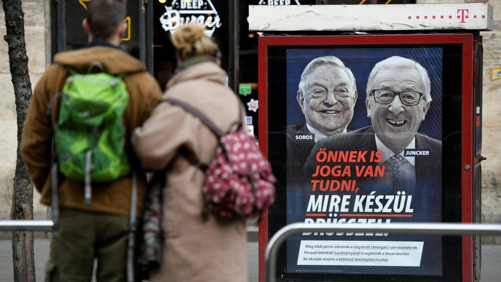 Government poster is seen in Budapest, Hungary, February 21, 2019. The poster reads, "You also have the right to know what Brussels is up to", accusing European Commission President Jean-Claude Juncker of pushing migration plans encouraged by U.S.-Hungarian businessman George Soros