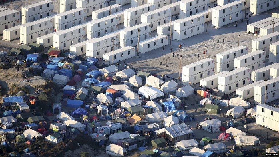 Temporary cabins and tents side by side