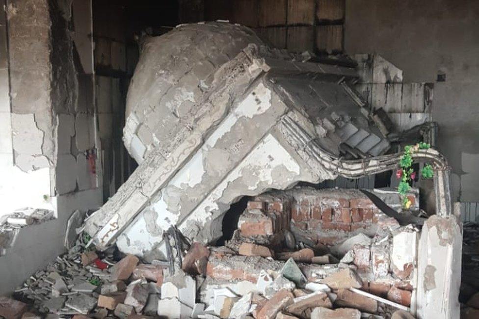 Part of the Teri shrine collapsed after the violence