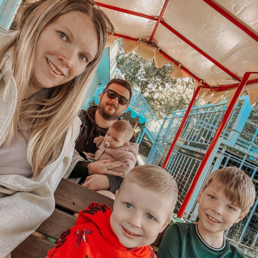 Kathryn James, son Griff and their family