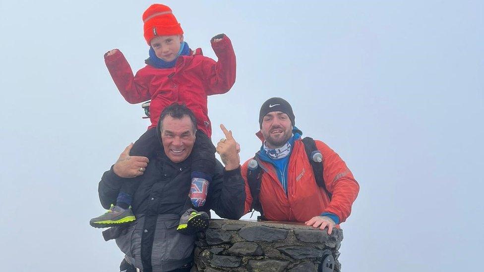 Albie Thomas with dad Daniel and Paddy Doherty