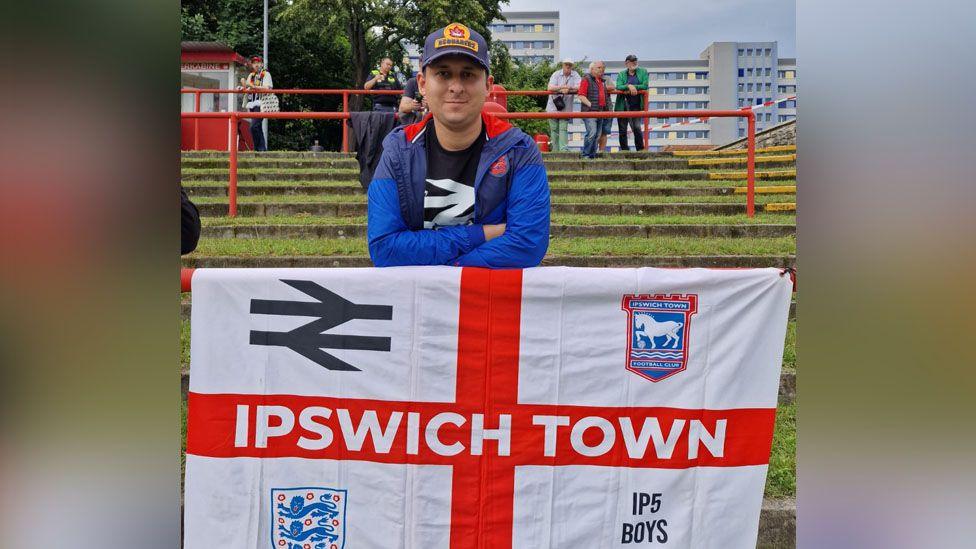 Karim Goodchild with an Ipswich Town flag