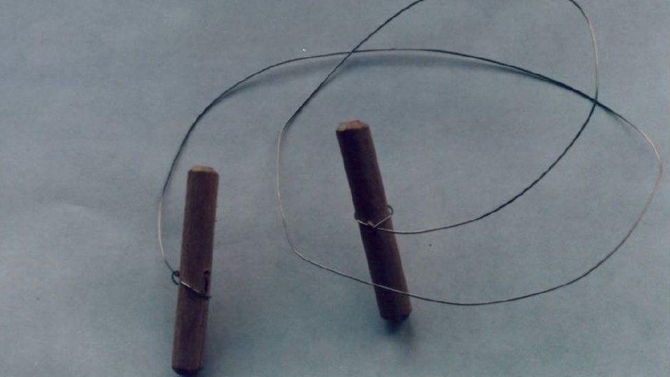 Replica of the cheese wire believed to have been used