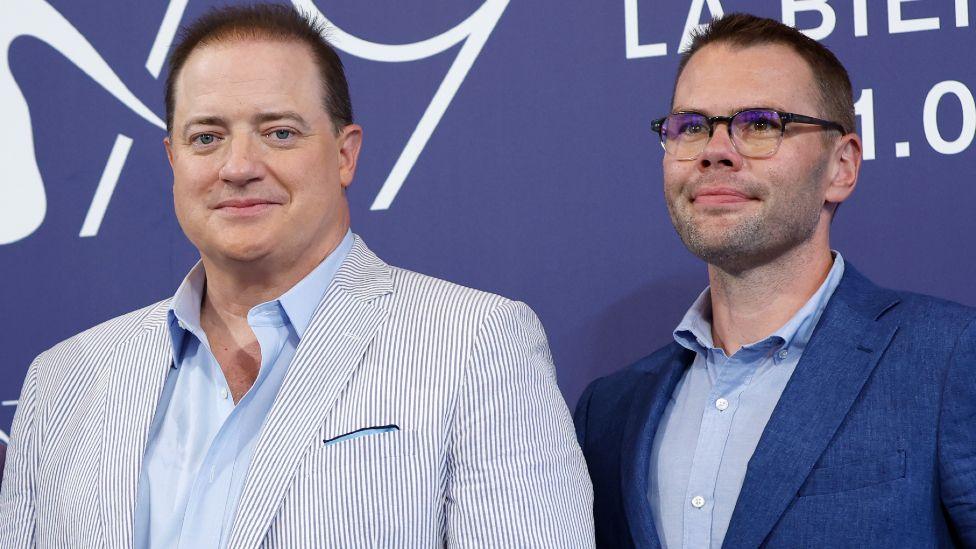 Brendan Fraser and Samuel D. Hunter attend the photocall for "The Whale" at the 79th Venice International Film Festival on September 04, 2022 in Venice, Italy