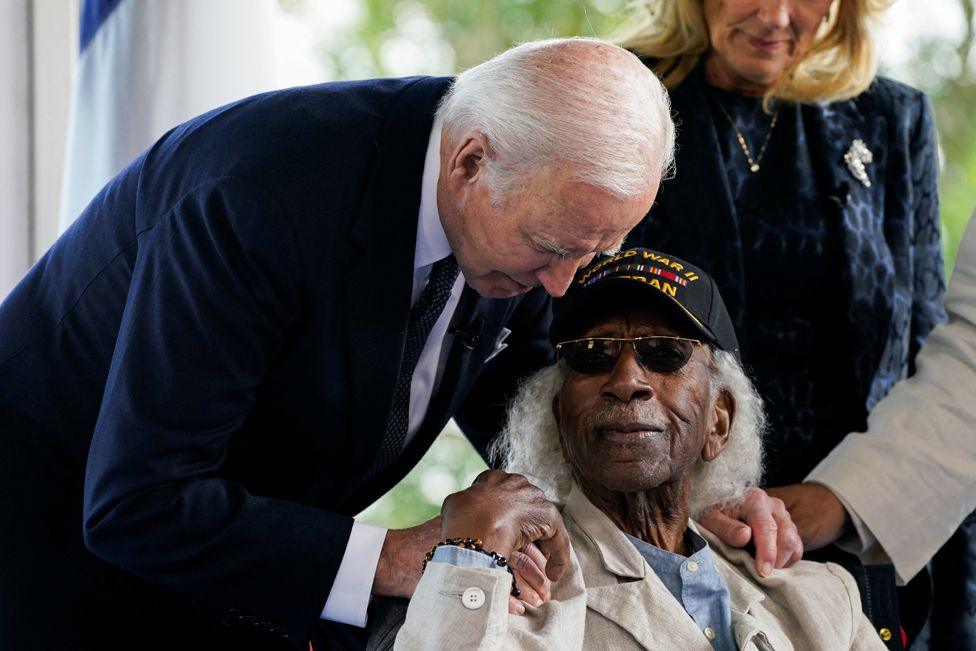 U.S President Joe Biden and first lady Jill Biden meet a World War II veteran on the day of a ceremony to mark the 80th anniversary of the 1944 D-Day landings at the Normandy American Cemetery and Memorial in Colleville-sur-Mer, France, June 6, 2024. 