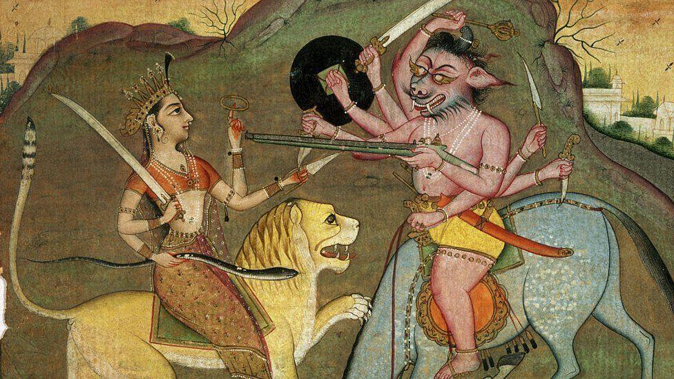 Durga-fighting-Mahishasura. 