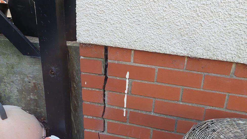 A crack to brickwork.