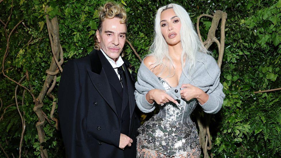 John Galliano and Kim Kardashian attend The 2024 Met Gala Celebrating "Sleeping Beauties: Reawakening Fashion" at The Metropolitan Museum of Art on May 06, 2024 in New York City.