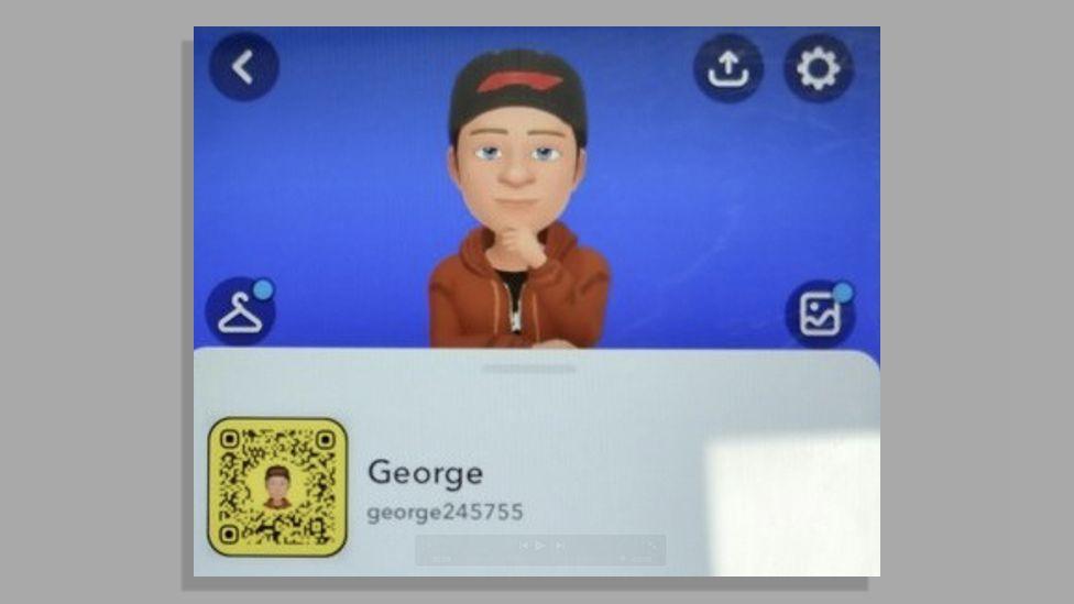 Lipscombe used the name of George when he chatted to Olivia. His Snapchat emoji character appears to be a young man with a black hat. He is wearing a brown hoody with a black T-shirt underneath. He has his hand on his chin.