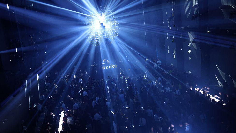 Guests attend an after-party, following Italian fashion house Gucci's 2024 Cruise Collection Fashion Show, at the Tate Modern in London on May 13, 2024