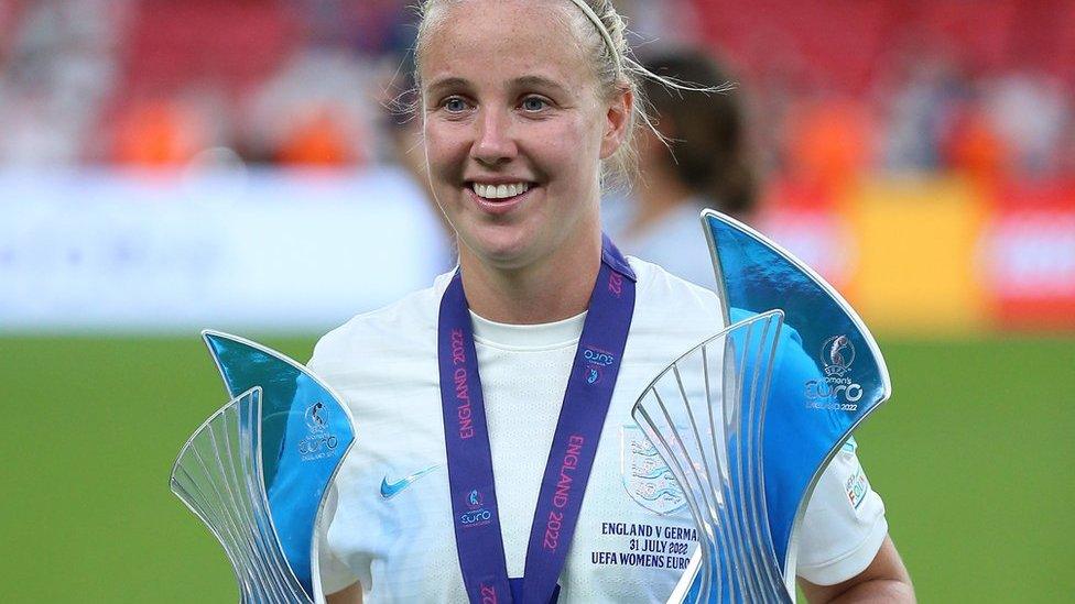 Beth Mead holds the player of the tournament and top goal scorer trophies