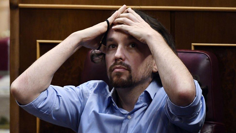 Spanish far-left Podemos party leader Pablo Iglesias arranges his hair during the second day of the parliamentary investiture debate to vote for a premier at the Spanish Congress (Las Cortes) in Madrid on July 23, 2019