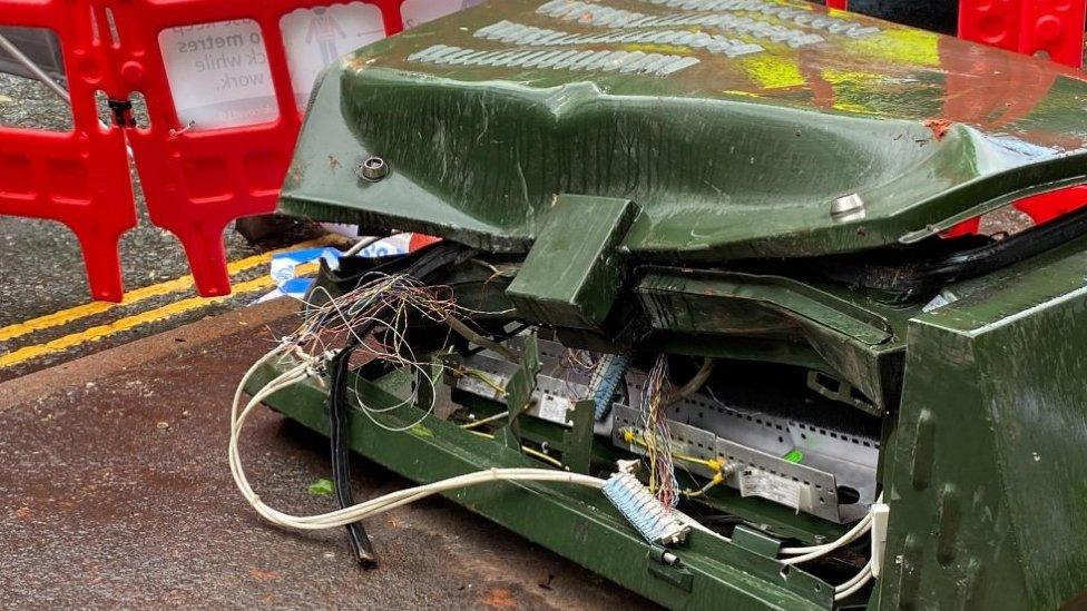 Destroyed telecoms cabinet