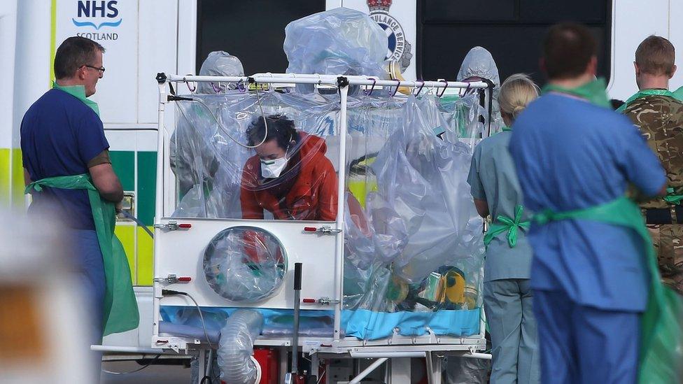 Pauline Cafferkey being transported at airport