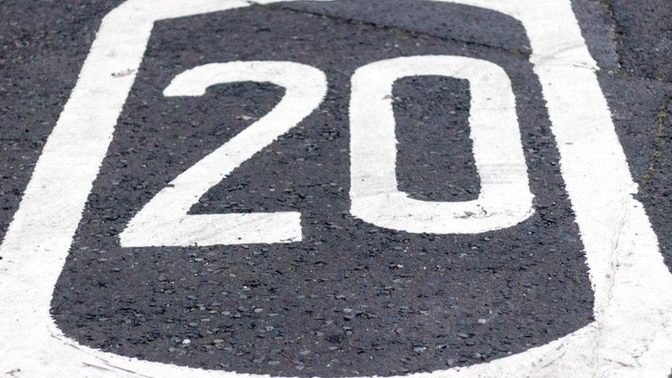 20mph marking on road