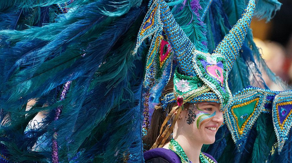 Performers from Edinburgh Festival Carnival parade entertain the crowds in Princes Street Gardens in Edinburgh during a Platinum Jubilee event on day four of the Platinum Jubilee celebrations.