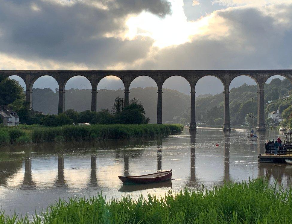 A bridge reflected in water