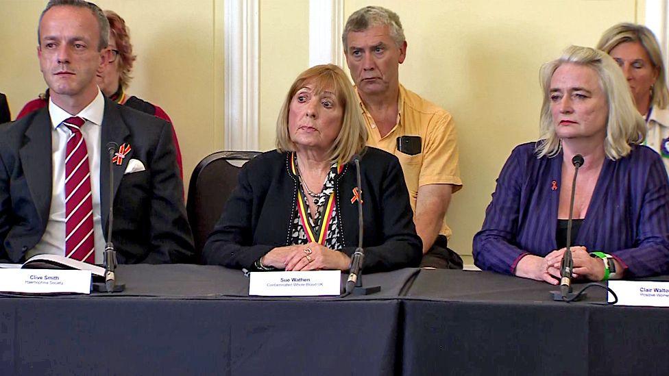 Victims of the infected blood scandal speaking at a press conference