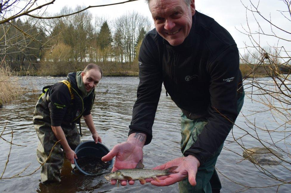 Officers with fish