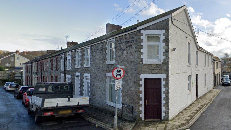 street view of Green with cars parked roadside