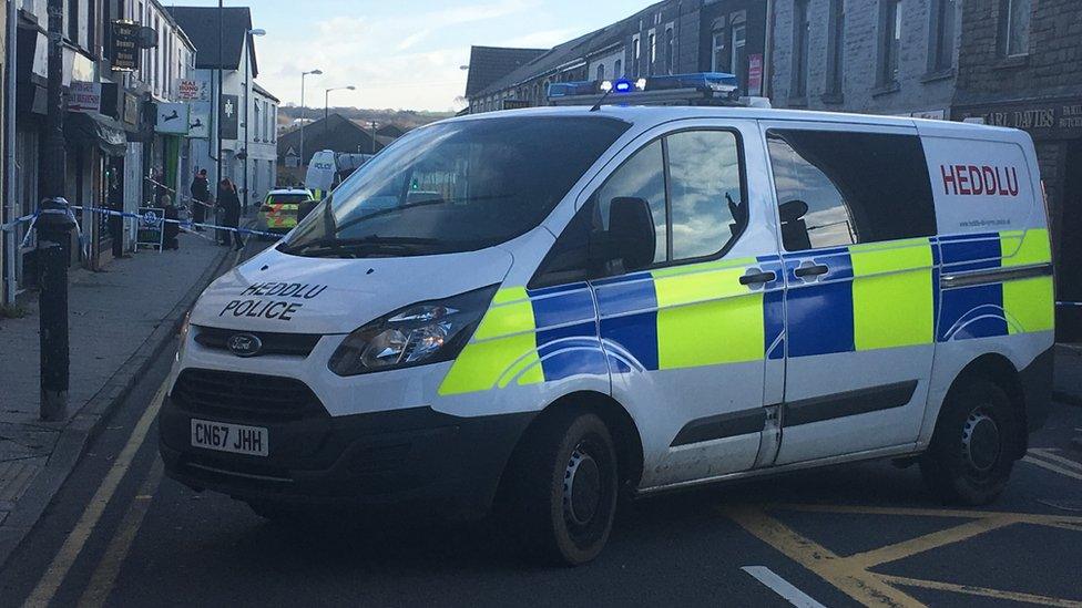 A police van on High Street