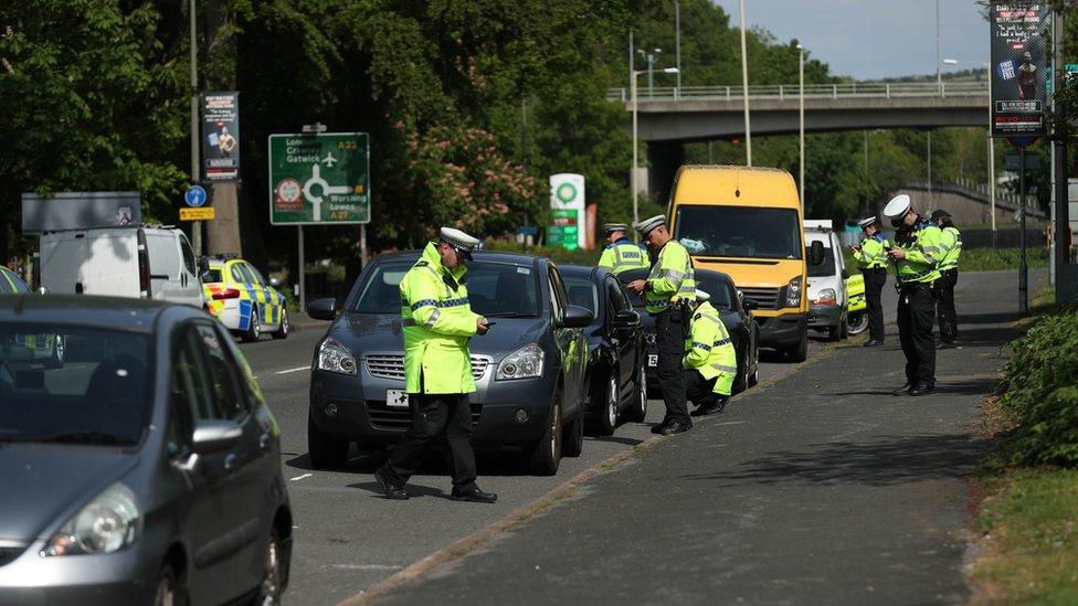 Police stopping cars between London and Brighton