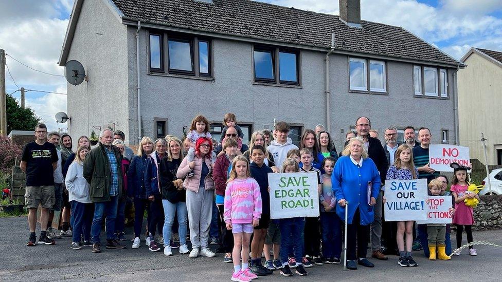 Protesters outside the home of 67-year-old Grace Donaldson