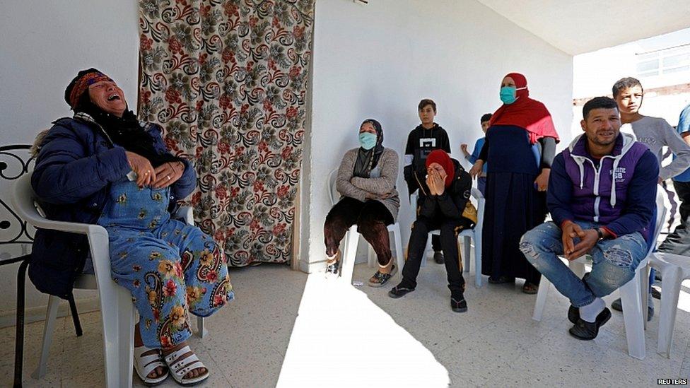 Gamra, the mother of Brahim Aouissaoui, reacts at her home in Thina, a suburb of Sfax, Tunisia, October 30, 2020