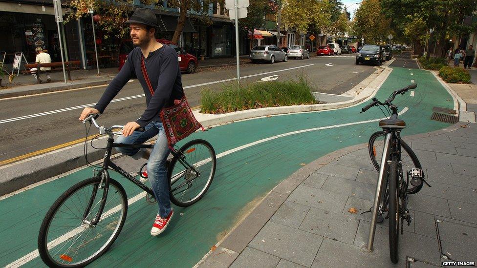 A man riding a bike in Sydney, Australia