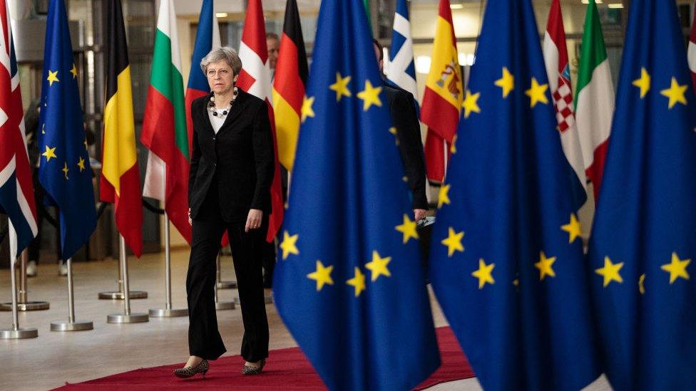 Theresa May arriving at a Council of the EU summit earlier in the year