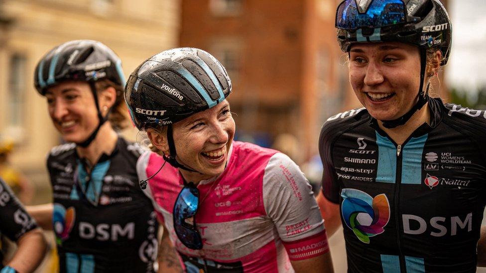 Race winner and yellow jersey holder after stage three of The Women's Tour from Tewkesbury to Gloucester, Lorena Wiebes team DSM, chats with athletes after the race.