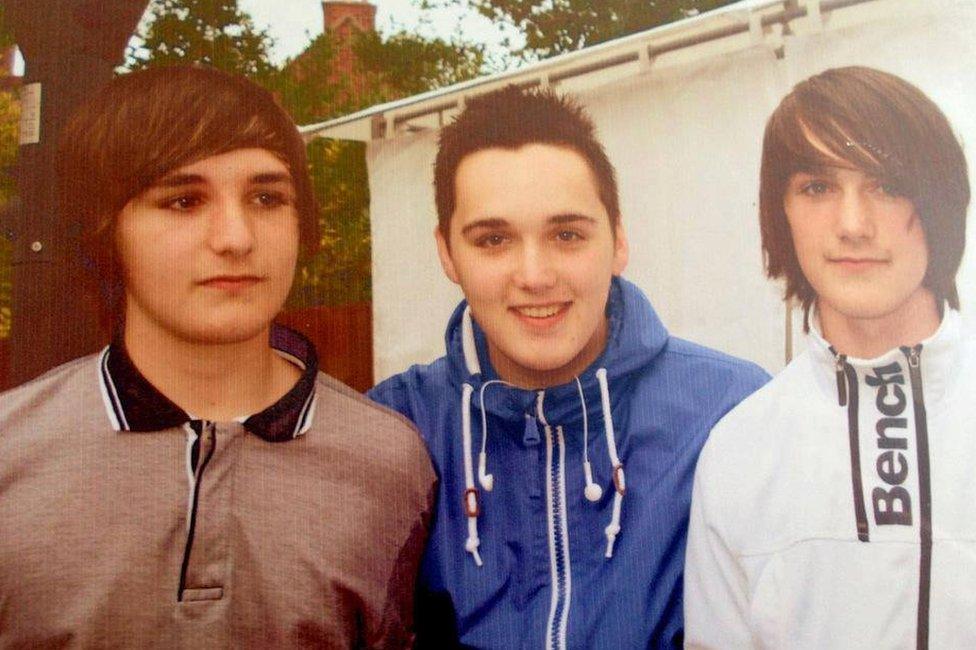 Callum with his brothers