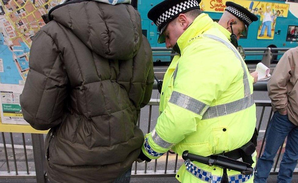 Officer carrying out stop and search